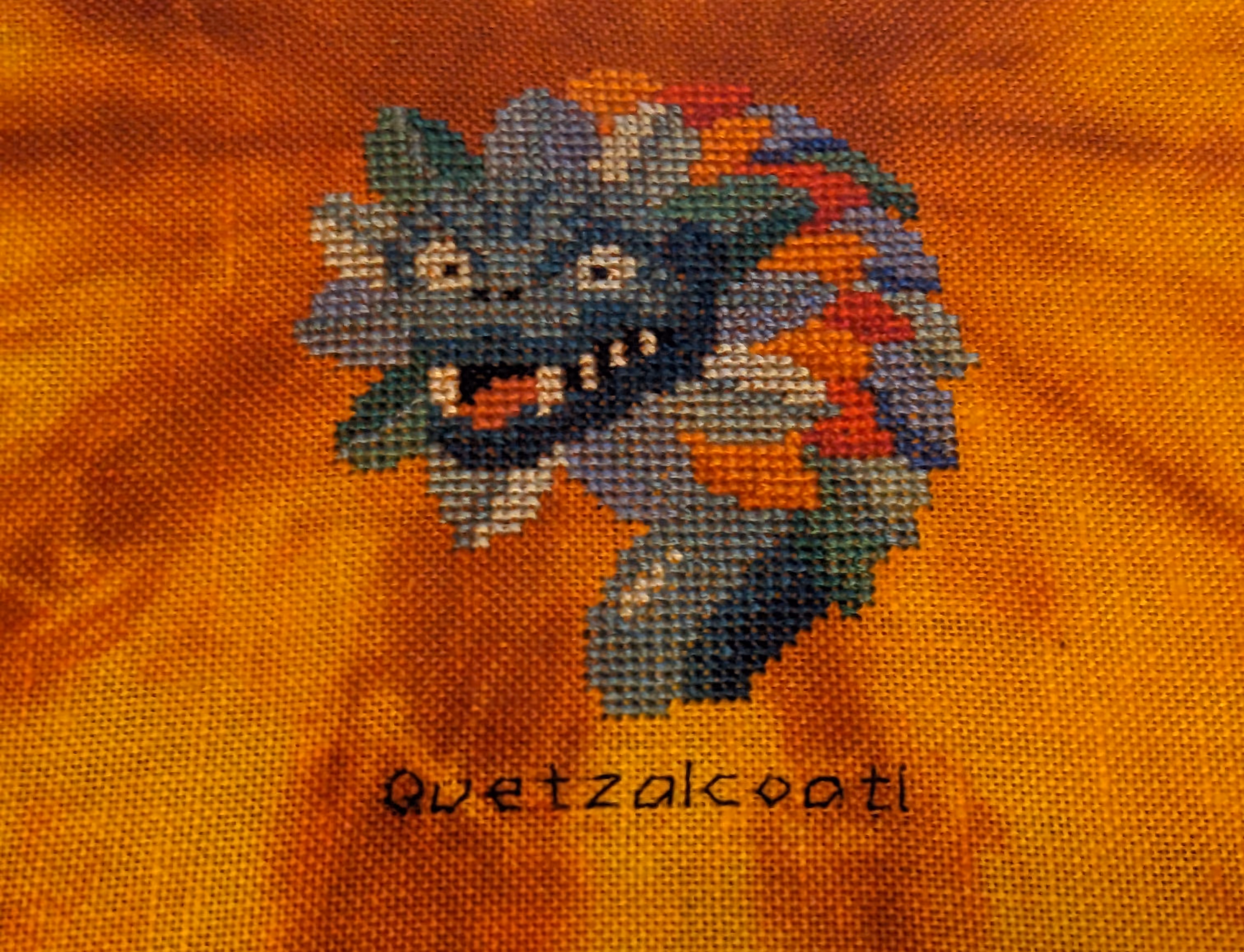 A dragon face with a colorful mane