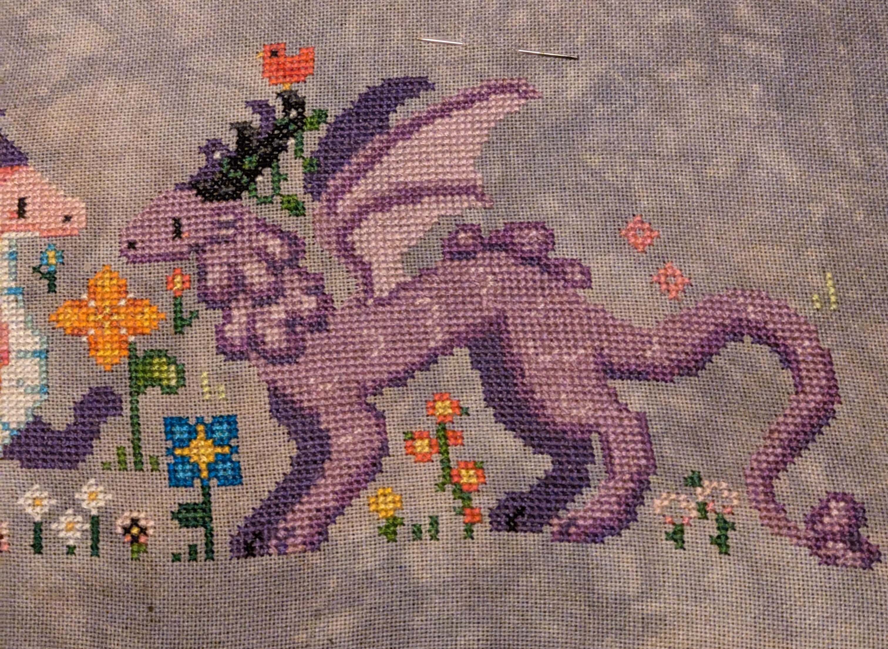 Image of a purple dragon inspired by the Wisteria flower that is surrounded by flowers and grass