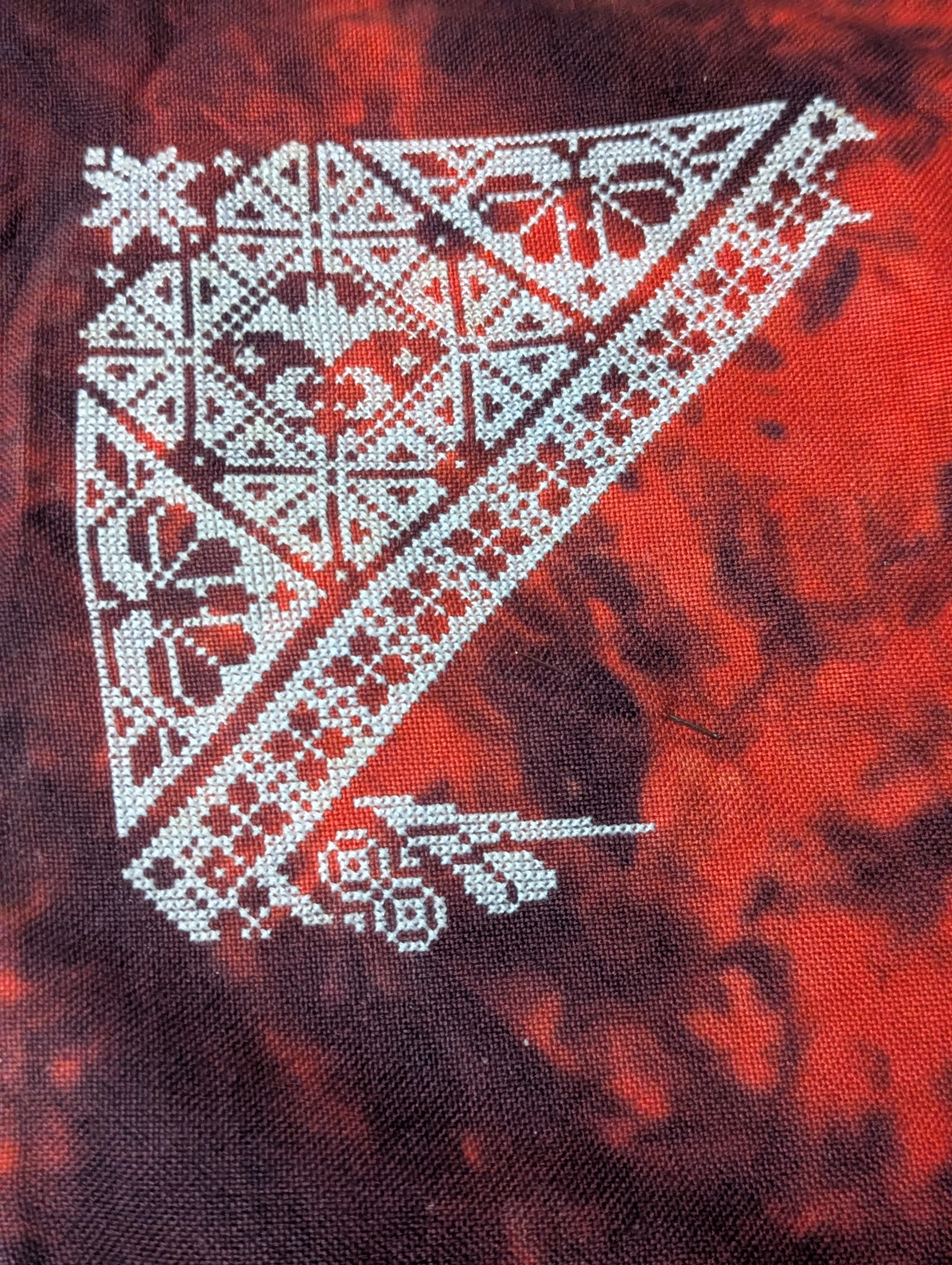 A geometric pattern featuring bats