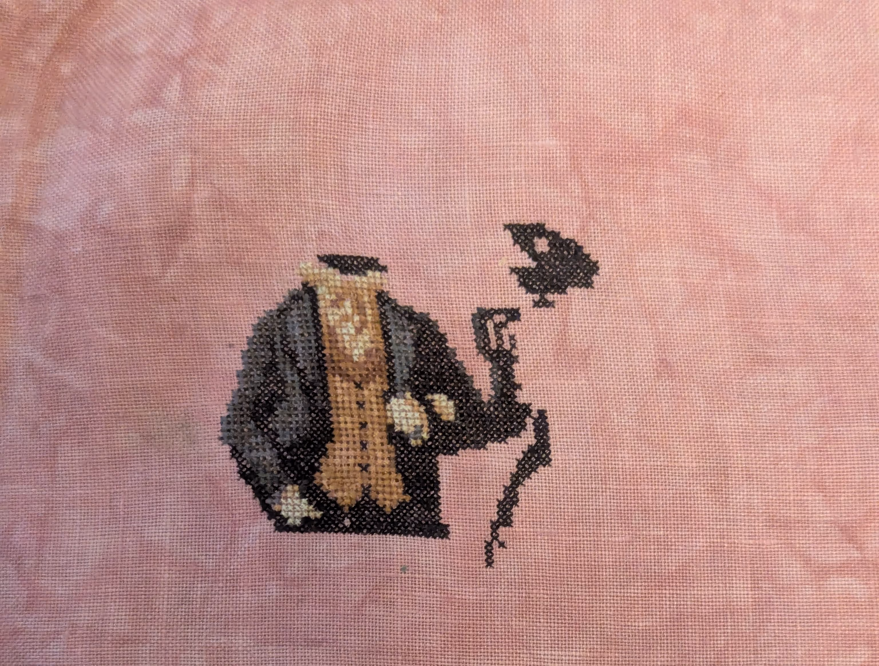 Two corvid lovers wander together in a graveyard arm in arm