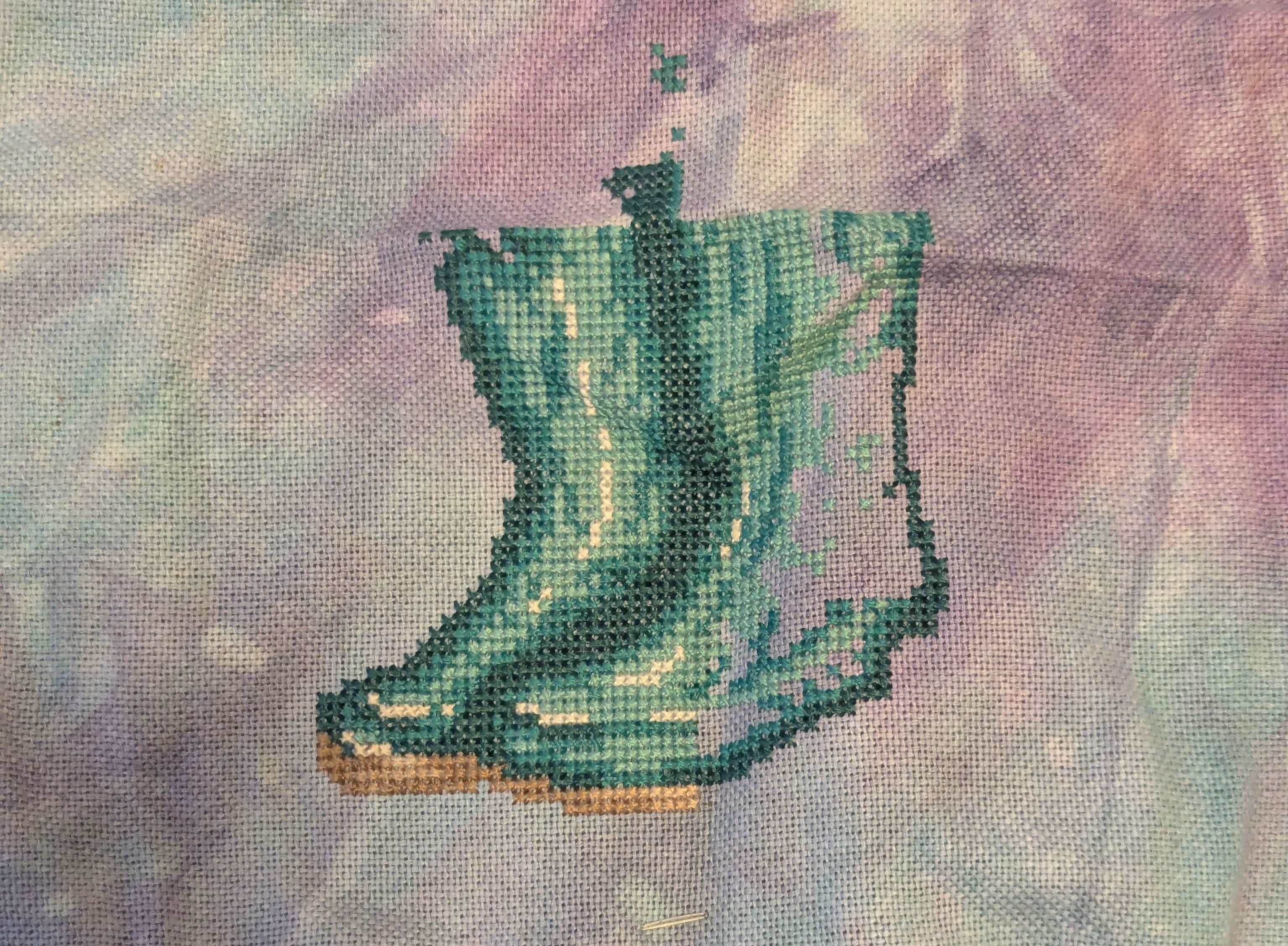A pair of teal rain boots bloom in the Spring