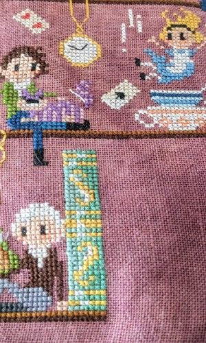 A bookshelf features famous authors next to fancy books, globes, and other things while sitting next to imagery from their popular works on a vintage rose linen