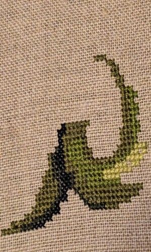 The tentacles of an octopus like sea witch in shades of green