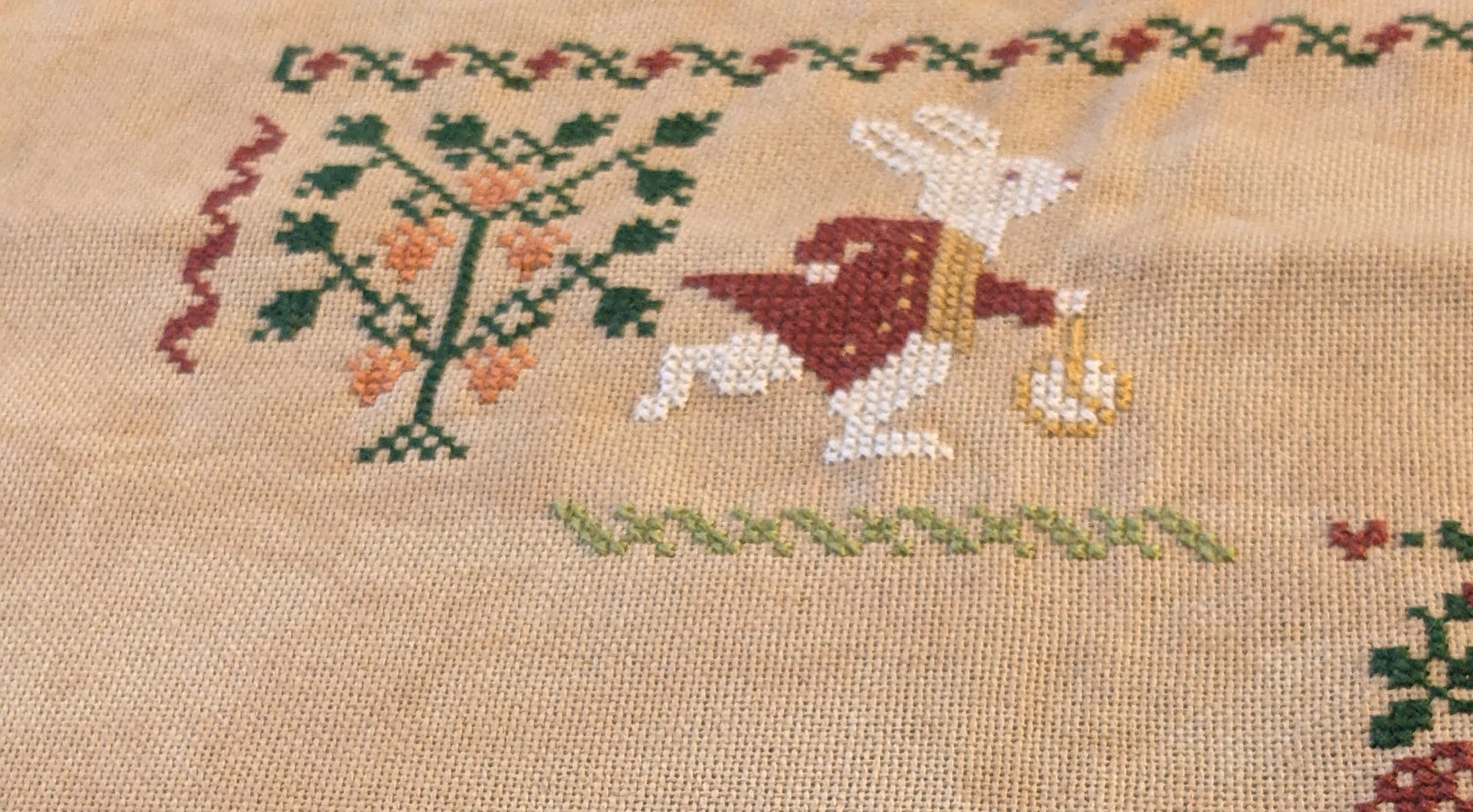 Image of the white rabbit from Alice in Wonderland in cross stitch