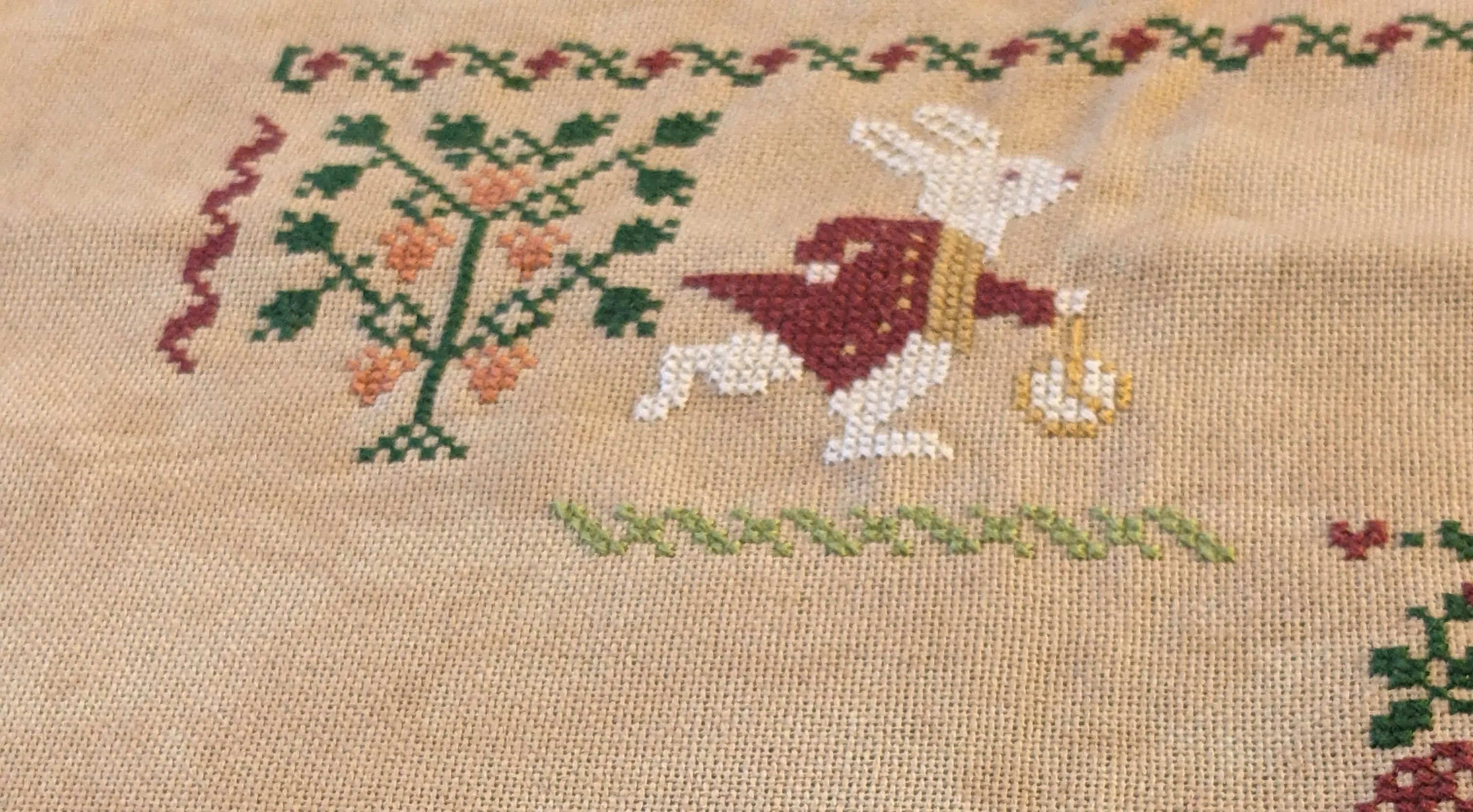 Image of the white rabbit from Alice in Wonderland in cross stitch